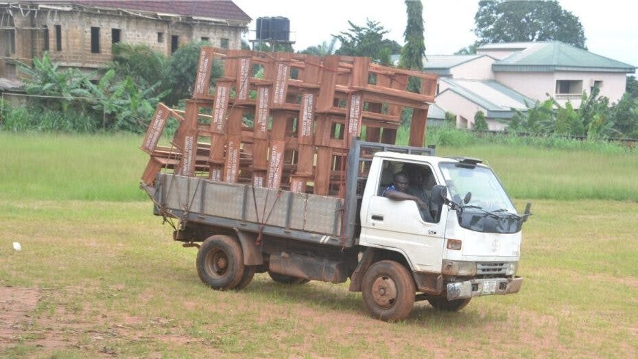 Image of a truck supplying the school desks.