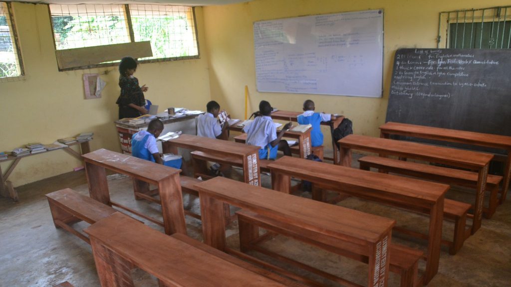 Children sitting in the classroom.