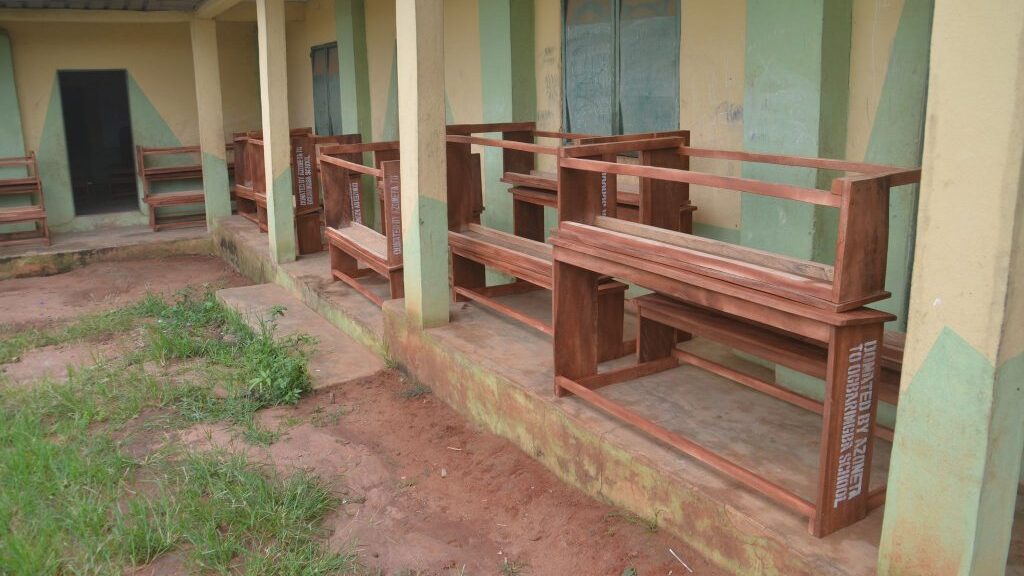 Recently donated school desks to the school
