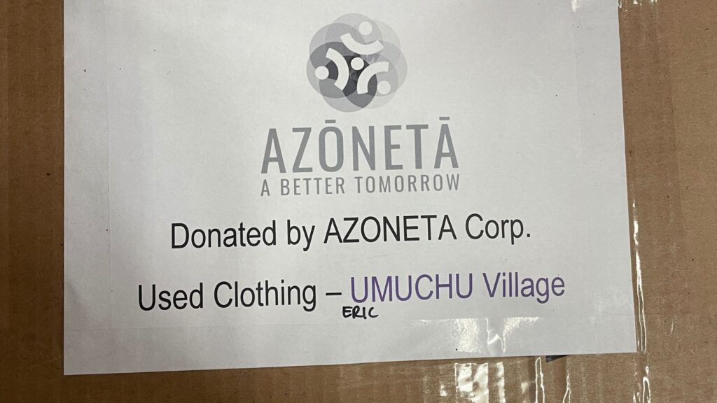 An image showing a box of clothing destined for a community in South East Nigeria.