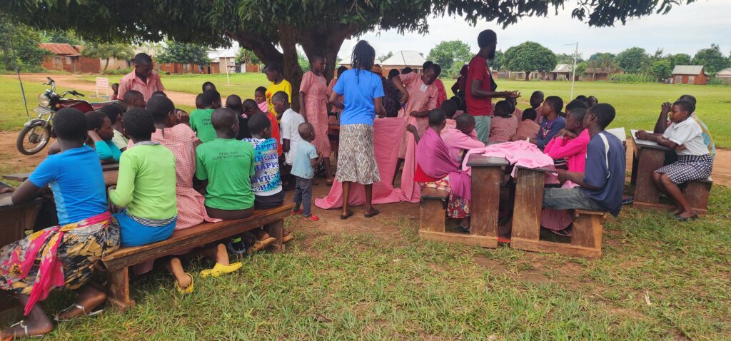 Girls and community members are learning how to make reusable pads.