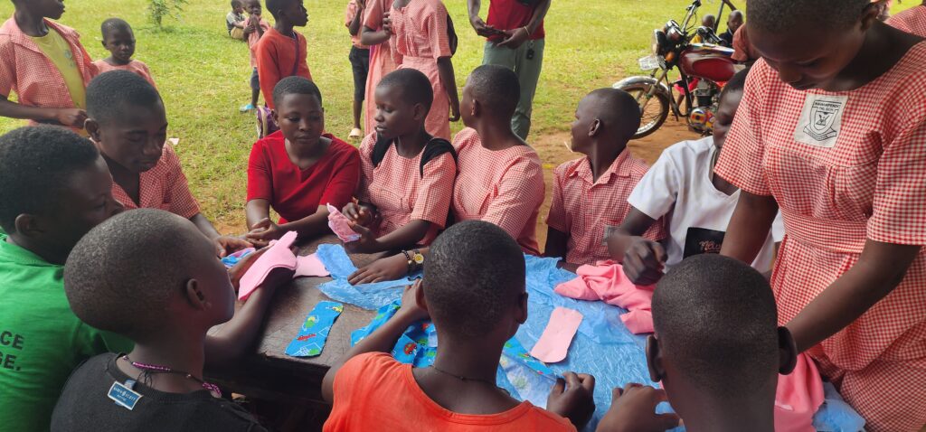 Girls and community members are learning how to make reusable pads.